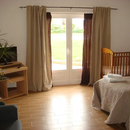 Quarto em Acomodações Particulares Casa De Flor Do Jardim *