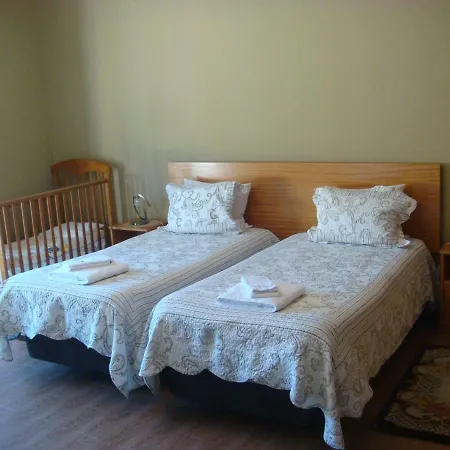 Quarto em Acomodações Particulares Casa De Flor Do Jardim